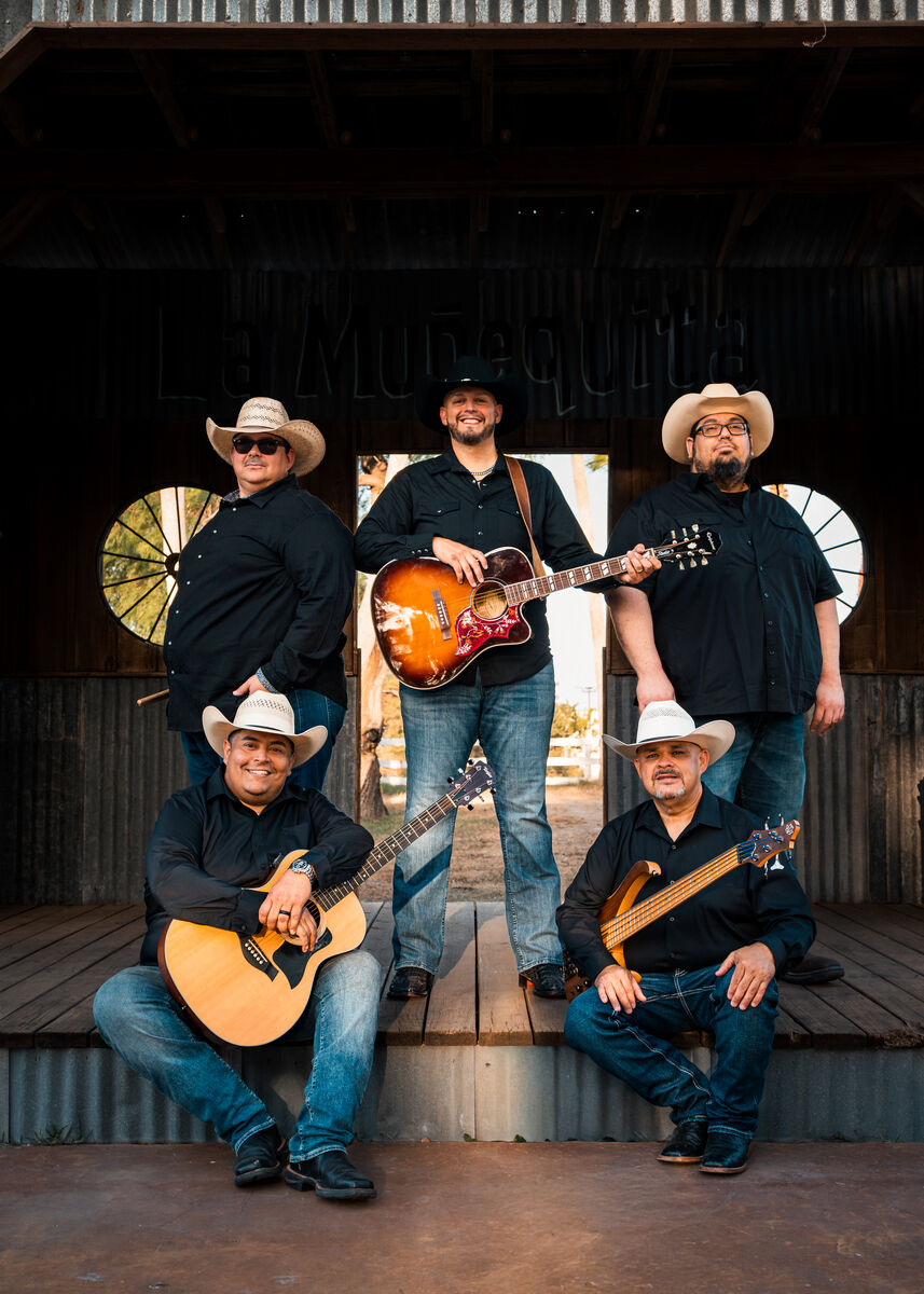 JB Flores & Wreckless Heart on stage with guitars